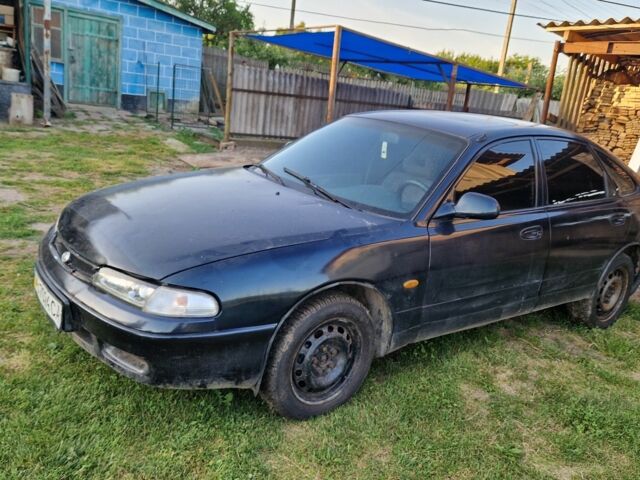 Зелений Мазда 626, об'ємом двигуна 2 л та пробігом 600 тис. км за 897 $, фото 1 на Automoto.ua