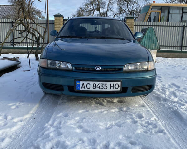 Зеленый Мазда 626, объемом двигателя 1.8 л и пробегом 327 тыс. км за 2300 $, фото 1 на Automoto.ua