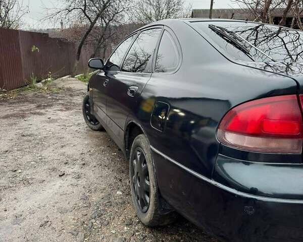 Зеленый Мазда 626, объемом двигателя 2 л и пробегом 320 тыс. км за 1500 $, фото 1 на Automoto.ua