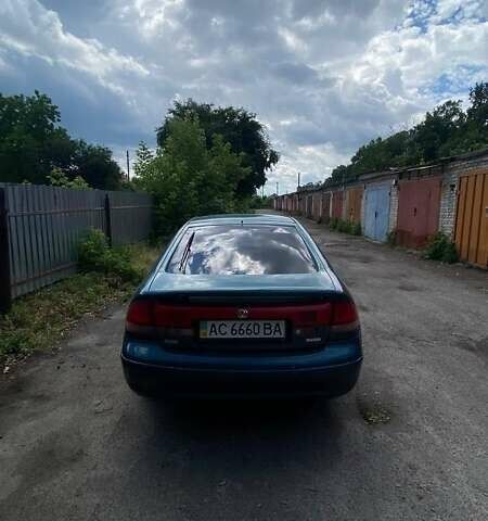 Зеленый Мазда 626, объемом двигателя 1.8 л и пробегом 350 тыс. км за 1070 $, фото 1 на Automoto.ua