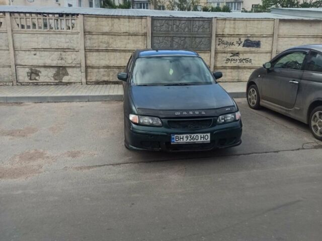 Зеленый Мазда 626, объемом двигателя 2 л и пробегом 330 тыс. км за 2700 $, фото 1 на Automoto.ua