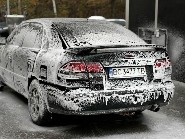 Зеленый Мазда 626, объемом двигателя 2 л и пробегом 200 тыс. км за 1901 $, фото 1 на Automoto.ua