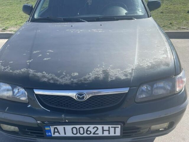 Зеленый Мазда 626, объемом двигателя 2 л и пробегом 320 тыс. км за 2200 $, фото 1 на Automoto.ua