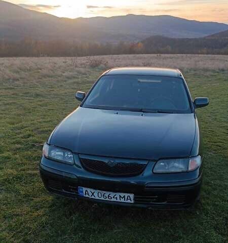 Зеленый Мазда 626, объемом двигателя 1.99 л и пробегом 480 тыс. км за 800 $, фото 1 на Automoto.ua