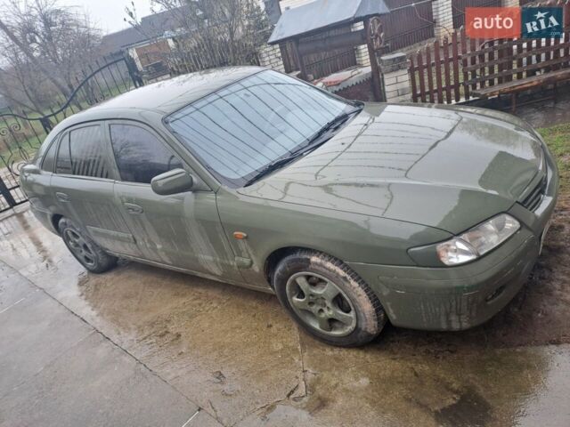 Зелений Мазда 626, об'ємом двигуна 2 л та пробігом 330 тис. км за 1000 $, фото 1 на Automoto.ua