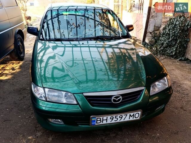 Зеленый Мазда 626, объемом двигателя 2 л и пробегом 480 тыс. км за 3302 $, фото 1 на Automoto.ua