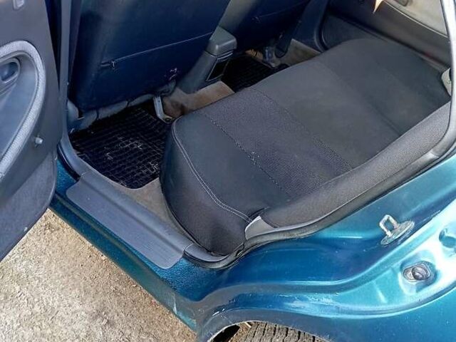 Зеленый Мазда 626, объемом двигателя 1.8 л и пробегом 500 тыс. км за 1900 $, фото 1 на Automoto.ua