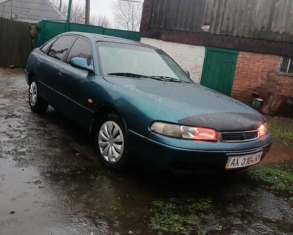 Зеленый Мазда 626, объемом двигателя 1.99 л и пробегом 350 тыс. км за 1000 $, фото 1 на Automoto.ua