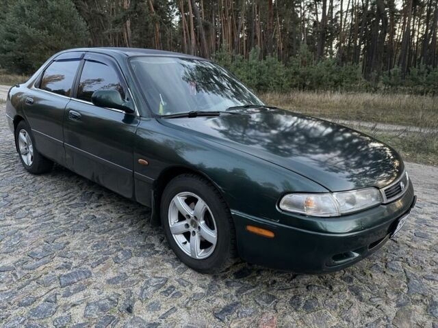 Зеленый Мазда 626, объемом двигателя 2 л и пробегом 265 тыс. км за 2250 $, фото 1 на Automoto.ua