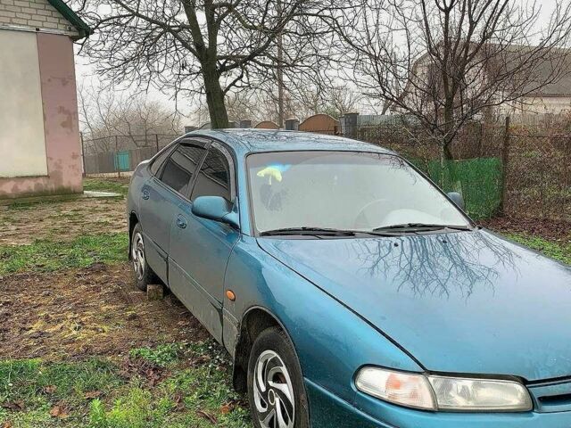 Зеленый Мазда 626, объемом двигателя 2 л и пробегом 1 тыс. км за 3074 $, фото 1 на Automoto.ua