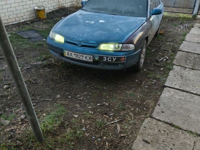 Зеленый Мазда 626, объемом двигателя 1.8 л и пробегом 330 тыс. км за 1000 $, фото 1 на Automoto.ua