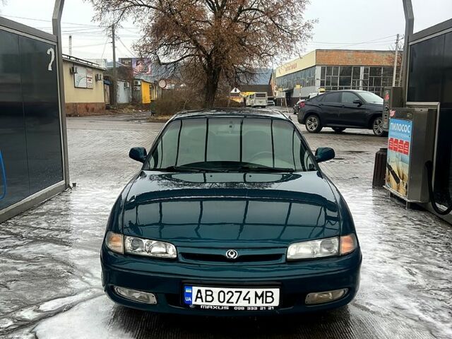 Зеленый Мазда 626, объемом двигателя 2 л и пробегом 354 тыс. км за 1700 $, фото 1 на Automoto.ua