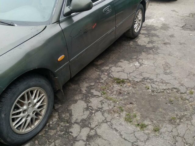 Зелений Мазда 626, об'ємом двигуна 2 л та пробігом 345 тис. км за 800 $, фото 1 на Automoto.ua