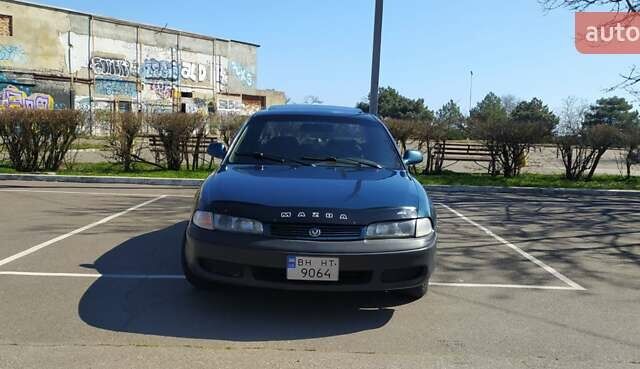 Зеленый Мазда 626, объемом двигателя 2 л и пробегом 611 тыс. км за 2600 $, фото 1 на Automoto.ua