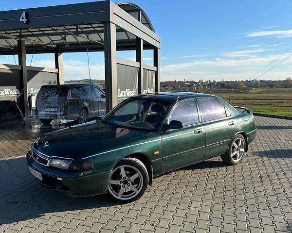 Зеленый Мазда 626, объемом двигателя 2 л и пробегом 300 тыс. км за 1300 $, фото 1 на Automoto.ua