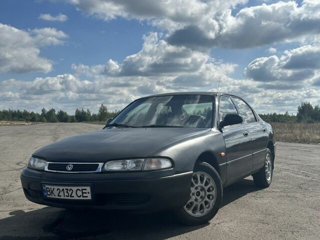 Зеленый Мазда 626, объемом двигателя 2 л и пробегом 342 тыс. км за 1450 $, фото 1 на Automoto.ua