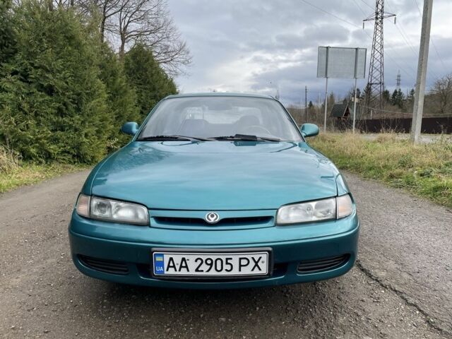 Зелений Мазда 626, об'ємом двигуна 2 л та пробігом 295 тис. км за 1750 $, фото 1 на Automoto.ua