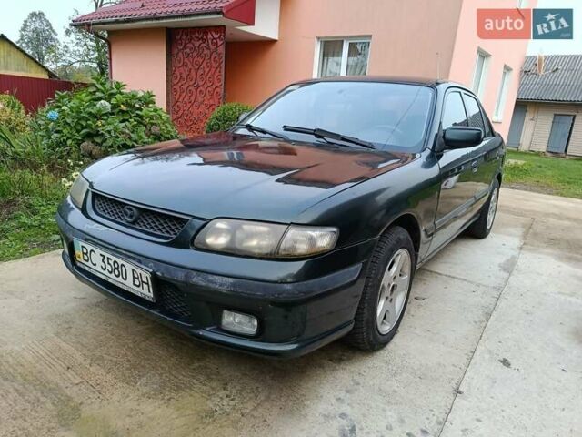 Зеленый Мазда 626, объемом двигателя 2 л и пробегом 270 тыс. км за 1800 $, фото 1 на Automoto.ua