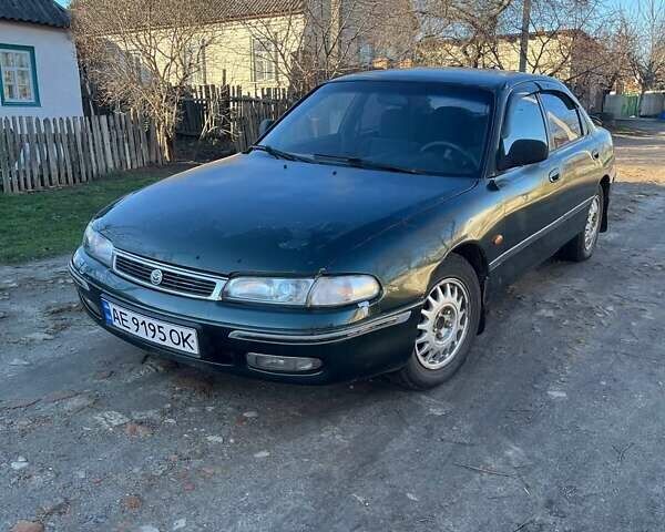 Зеленый Мазда 626, объемом двигателя 2.02 л и пробегом 300 тыс. км за 1450 $, фото 1 на Automoto.ua