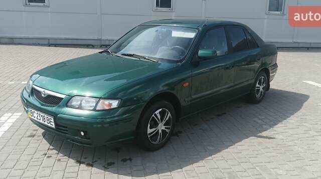 Зеленый Мазда 626, объемом двигателя 2 л и пробегом 332 тыс. км за 2500 $, фото 1 на Automoto.ua