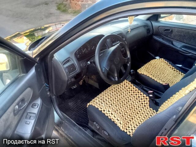 Зелений Мазда 626, об'ємом двигуна 2 л та пробігом 250 тис. км за 1251 $, фото 1 на Automoto.ua