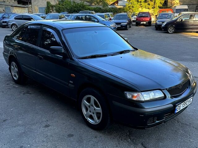 Зелений Мазда 626, об'ємом двигуна 2 л та пробігом 185 тис. км за 2350 $, фото 1 на Automoto.ua