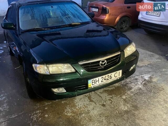 Зеленый Мазда 626, объемом двигателя 2 л и пробегом 245 тыс. км за 2300 $, фото 1 на Automoto.ua