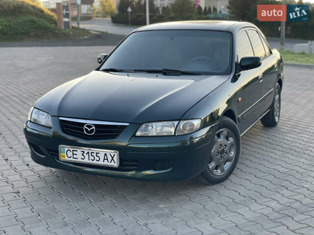 Зеленый Мазда 626, объемом двигателя 2 л и пробегом 284 тыс. км за 2450 $, фото 1 на Automoto.ua