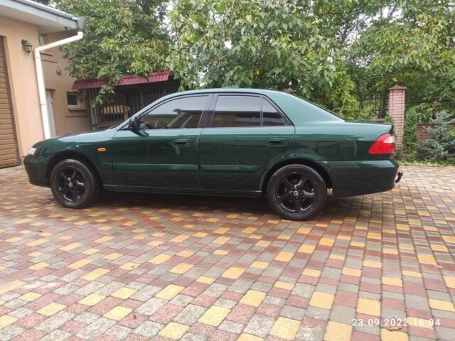 Зелений Мазда 626, об'ємом двигуна 2 л та пробігом 236 тис. км за 2727 $, фото 1 на Automoto.ua