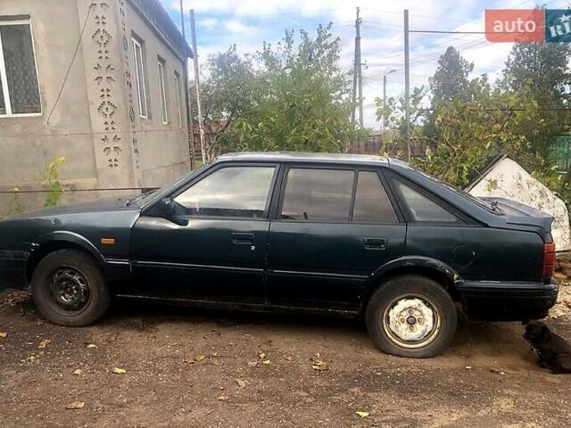 Зелений Мазда 626, об'ємом двигуна 2 л та пробігом 367 тис. км за 650 $, фото 1 на Automoto.ua