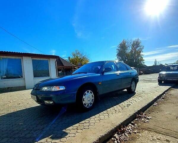 Зеленый Мазда 626, объемом двигателя 2 л и пробегом 250 тыс. км за 2300 $, фото 1 на Automoto.ua