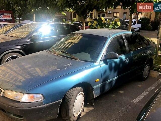 Зеленый Мазда 626, объемом двигателя 1.8 л и пробегом 211 тыс. км за 2000 $, фото 1 на Automoto.ua