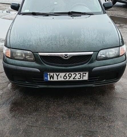 Зеленый Мазда 626, объемом двигателя 2 л и пробегом 320 тыс. км за 1499 $, фото 1 на Automoto.ua