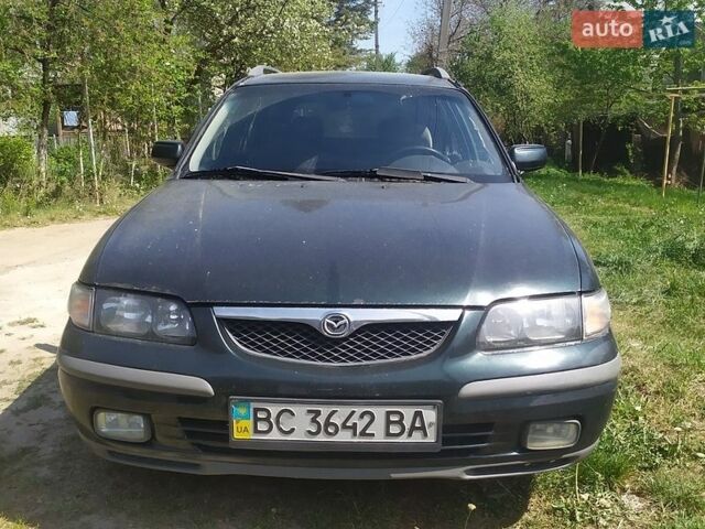 Зеленый Мазда 626, объемом двигателя 2 л и пробегом 327 тыс. км за 1470 $, фото 1 на Automoto.ua