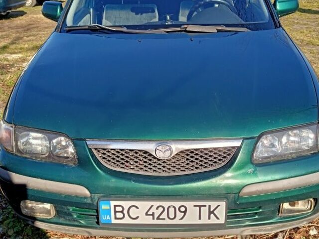 Зеленый Мазда 626, объемом двигателя 2 л и пробегом 340 тыс. км за 1900 $, фото 1 на Automoto.ua