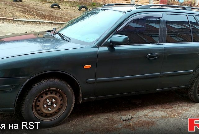 Зеленый Мазда 626, объемом двигателя 2 л и пробегом 400 тыс. км за 3100 $, фото 1 на Automoto.ua