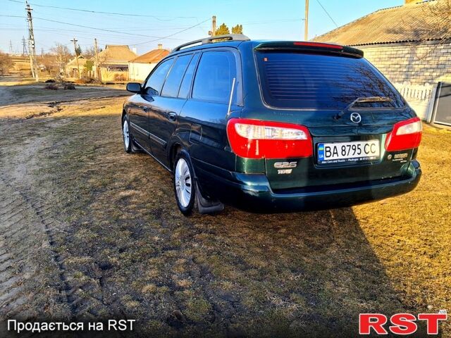 Зелений Мазда 626, об'ємом двигуна 2 л та пробігом 210 тис. км за 3800 $, фото 1 на Automoto.ua