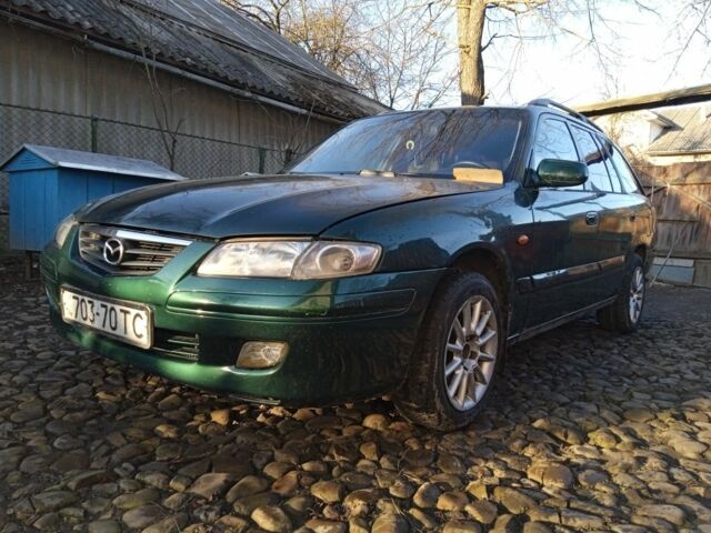 Зеленый Мазда 626, объемом двигателя 2 л и пробегом 458 тыс. км за 3000 $, фото 1 на Automoto.ua