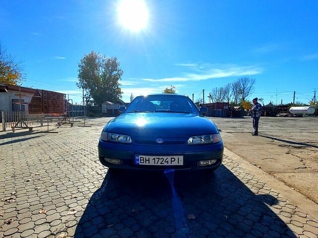 Зеленый Мазда 626, объемом двигателя 2 л и пробегом 250 тыс. км за 2300 $, фото 1 на Automoto.ua