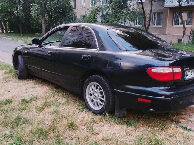 Черный Мазда 929, объемом двигателя 2.3 л и пробегом 290 тыс. км за 2410 $, фото 1 на Automoto.ua