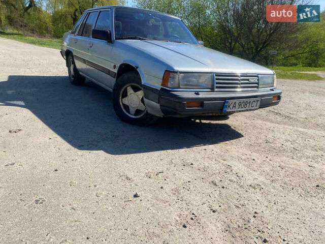 Серый Мазда 929, объемом двигателя 2 л и пробегом 500 тыс. км за 900 $, фото 1 на Automoto.ua