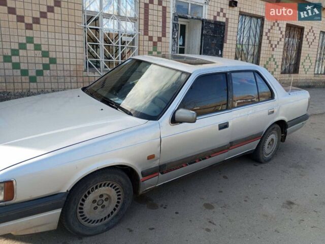 Сірий Мазда 929, об'ємом двигуна 2.2 л та пробігом 390 тис. км за 1000 $, фото 1 на Automoto.ua