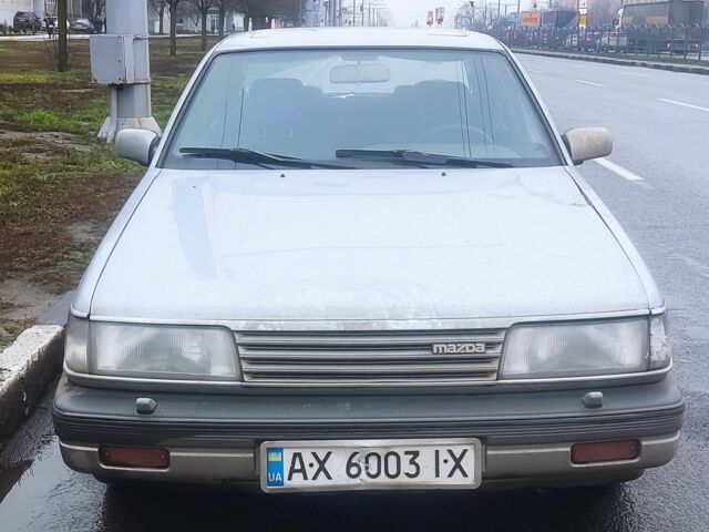 Серый Мазда 929, объемом двигателя 2.2 л и пробегом 340 тыс. км за 950 $, фото 1 на Automoto.ua