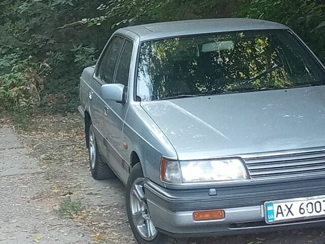 Серый Мазда 929, объемом двигателя 2 л и пробегом 291 тыс. км за 1700 $, фото 1 на Automoto.ua