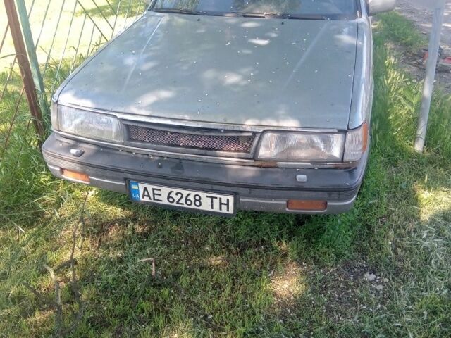 Серый Мазда 929, объемом двигателя 3 л и пробегом 283 тыс. км за 1500 $, фото 1 на Automoto.ua