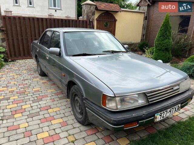 Серый Мазда 929, объемом двигателя 2.2 л и пробегом 383 тыс. км за 799 $, фото 1 на Automoto.ua