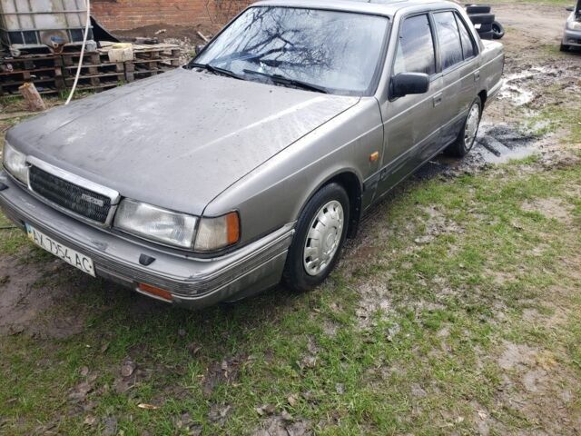 Серый Мазда 929, объемом двигателя 2 л и пробегом 400 тыс. км за 982 $, фото 1 на Automoto.ua