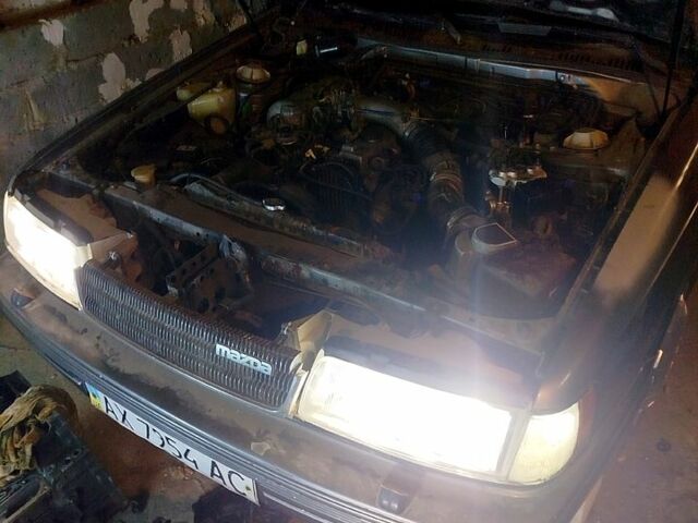 Серый Мазда 929, объемом двигателя 2.2 л и пробегом 256 тыс. км за 1400 $, фото 1 на Automoto.ua