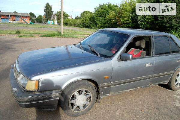 Сірий Мазда 929, об'ємом двигуна 2.2 л та пробігом 1000 тис. км за 1500 $, фото 1 на Automoto.ua