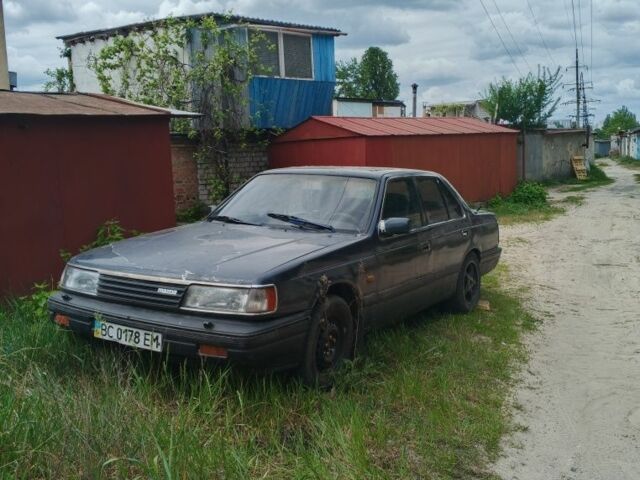 Синій Мазда 929, об'ємом двигуна 2 л та пробігом 500 тис. км за 650 $, фото 1 на Automoto.ua